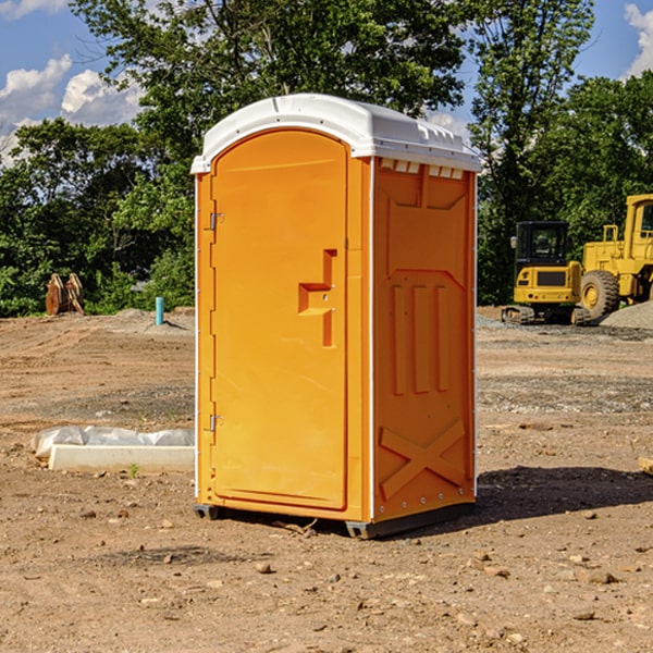 how often are the portable restrooms cleaned and serviced during a rental period in Pike KS